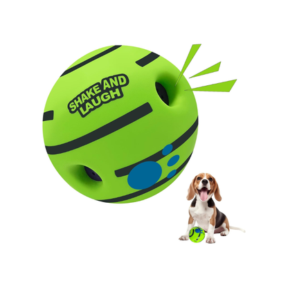 Bright lime green interactive dog ball with black accents and paw print design, next to a beagle puppy.