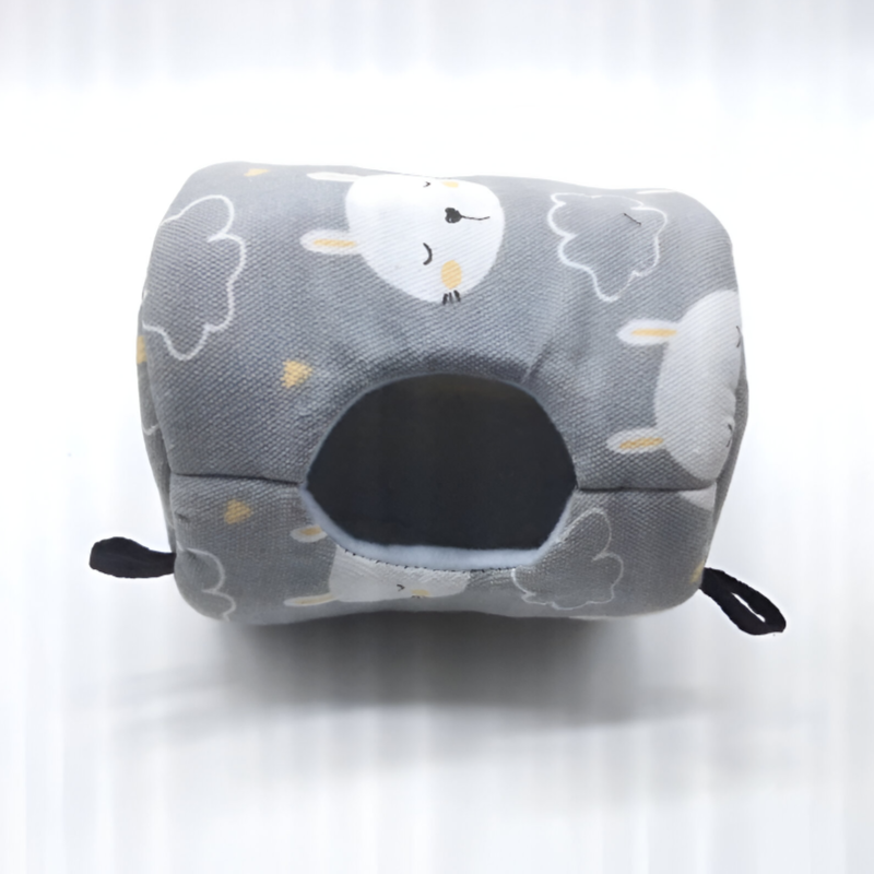 Gray fabric hammock bed with cloud and moon pattern, black entrance hole, and hanging straps for small pets.